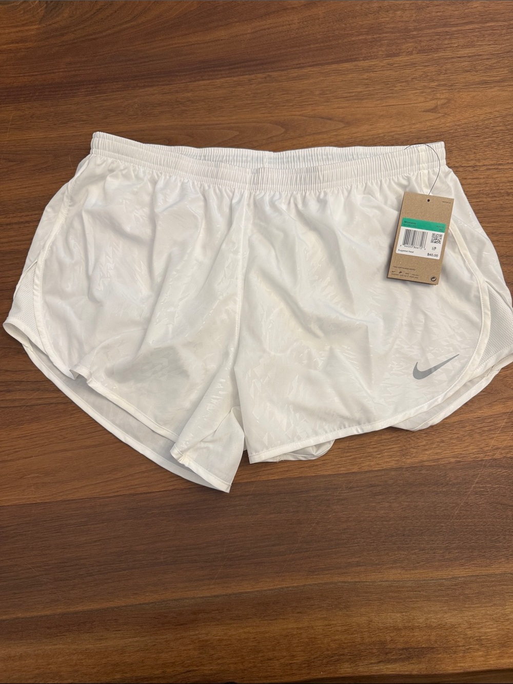 Nike Women's White Athletic Running Shorts with Silver Swoosh